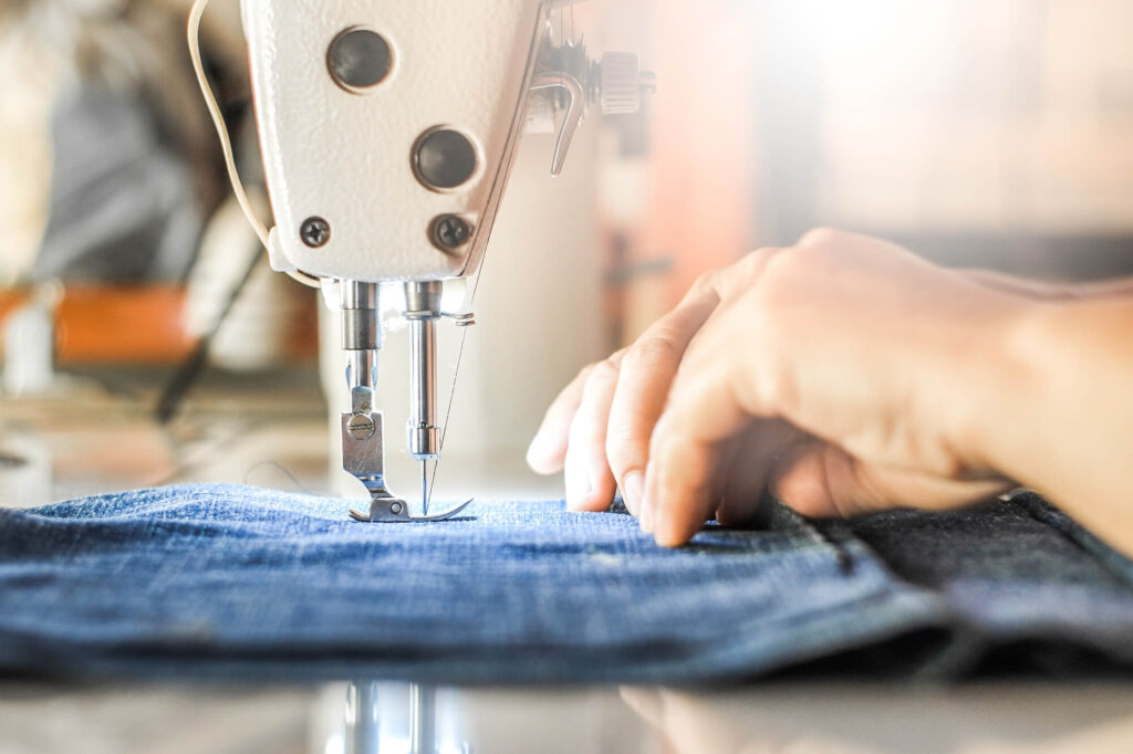 sewing machine sewing denim